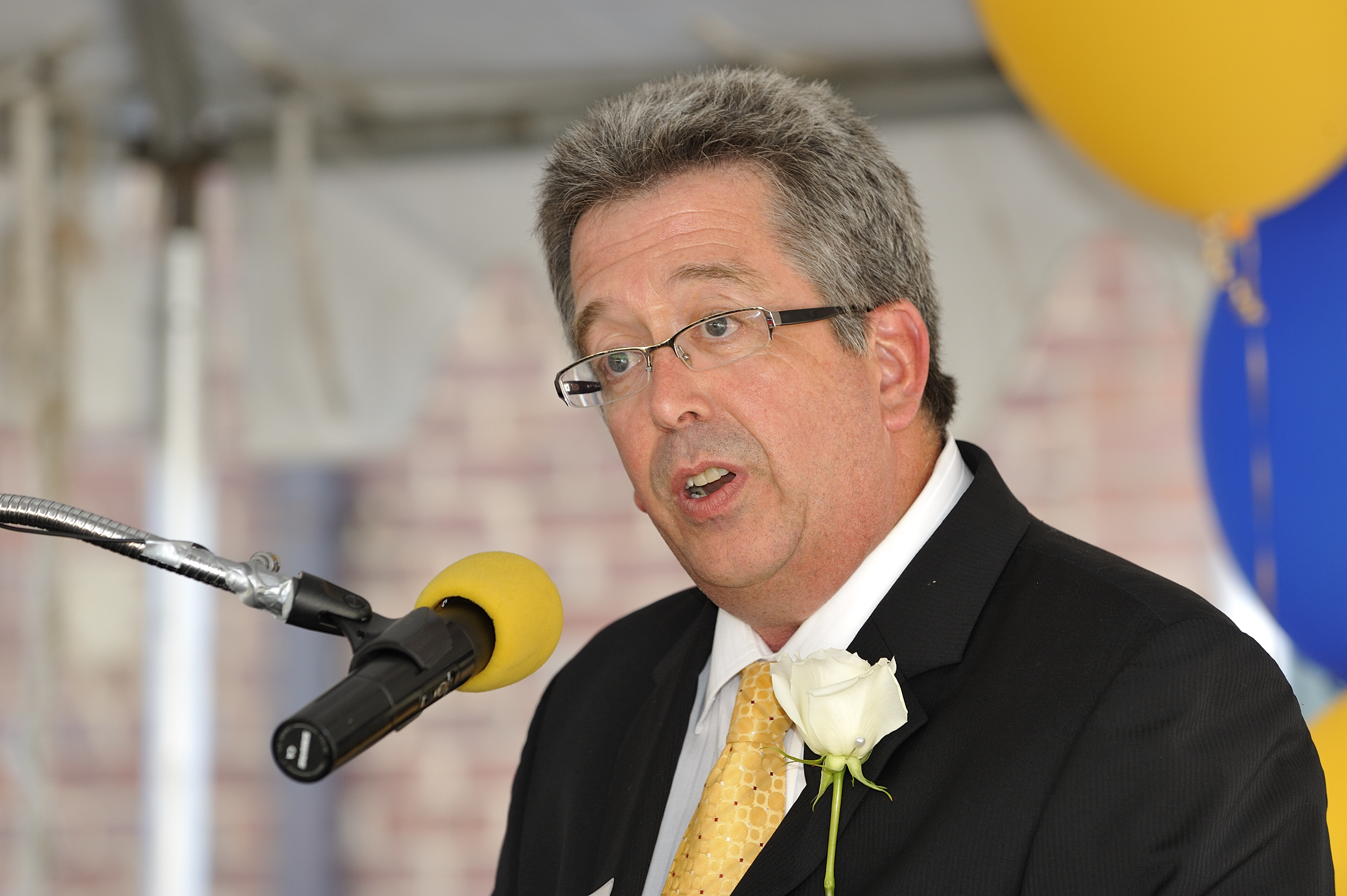 Dr. David Baker at a podium