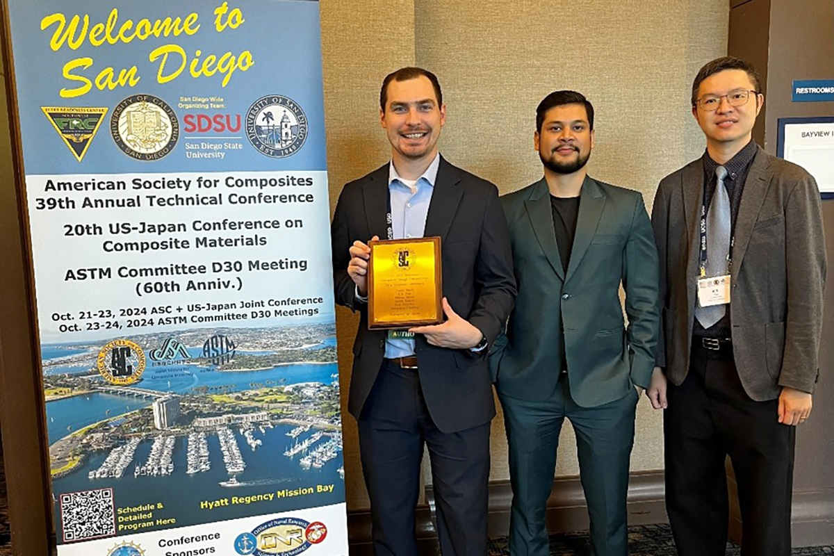 Team Akron, led by Jason Mack (fourth-year Ph.D. student in mechanical engineering, left), team member Faizan Mirza (third-year Ph.D. student in mechanical engineering, middle), and team advisor Prof. K.T. Tan (associate professor of mechanical engineering, right).