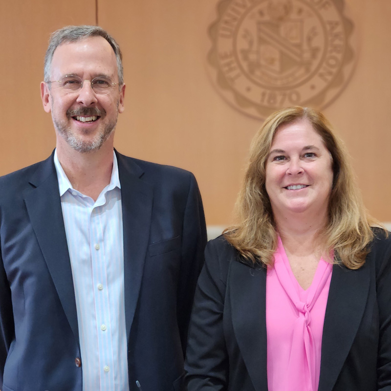 A number of conference panelists and moderators posed outside the courtroom during a break.