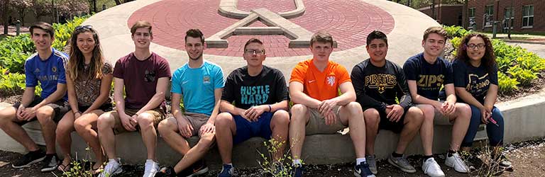 Transfer students outside of the Honors Complex on The University of Akron campus